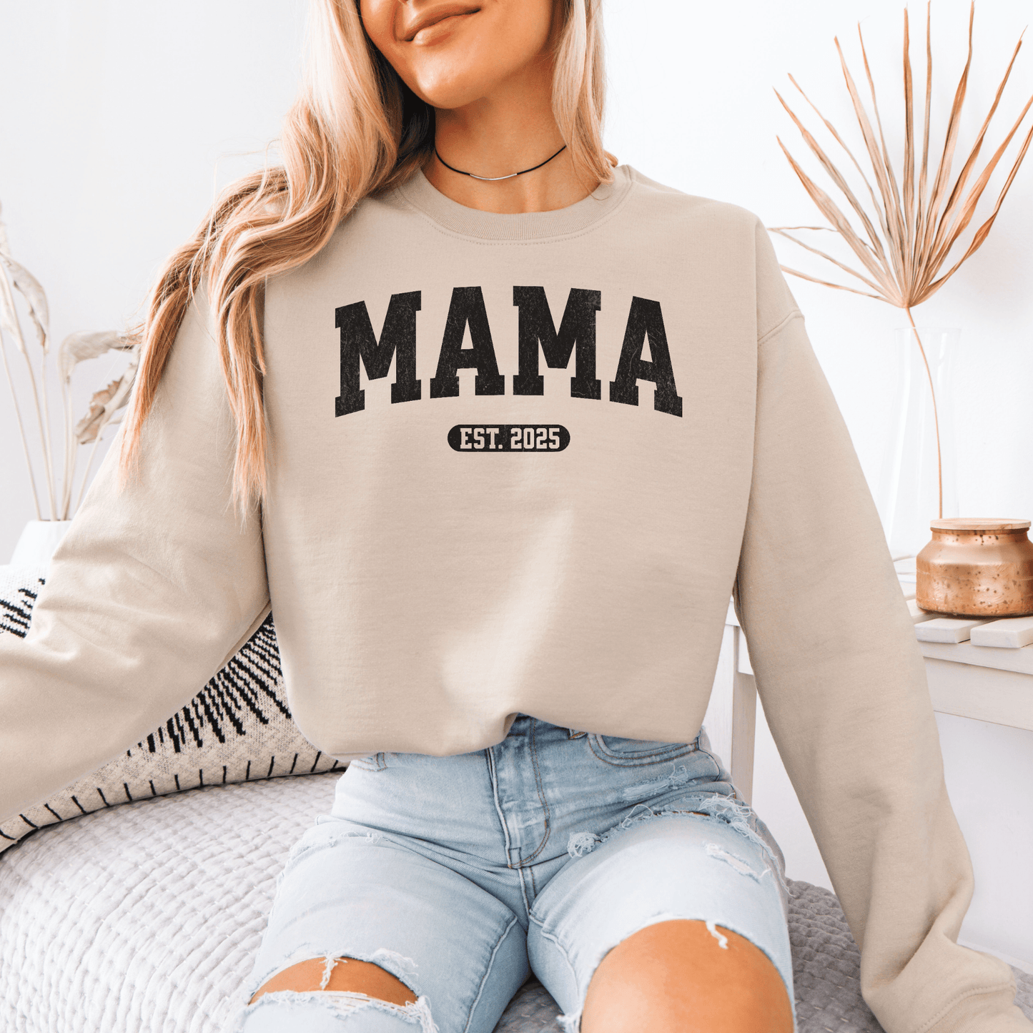 Woman wearing Custom Mama EST Year Sweatshirt beige crewneck with MAMA graphic and EST 2025 vintage style