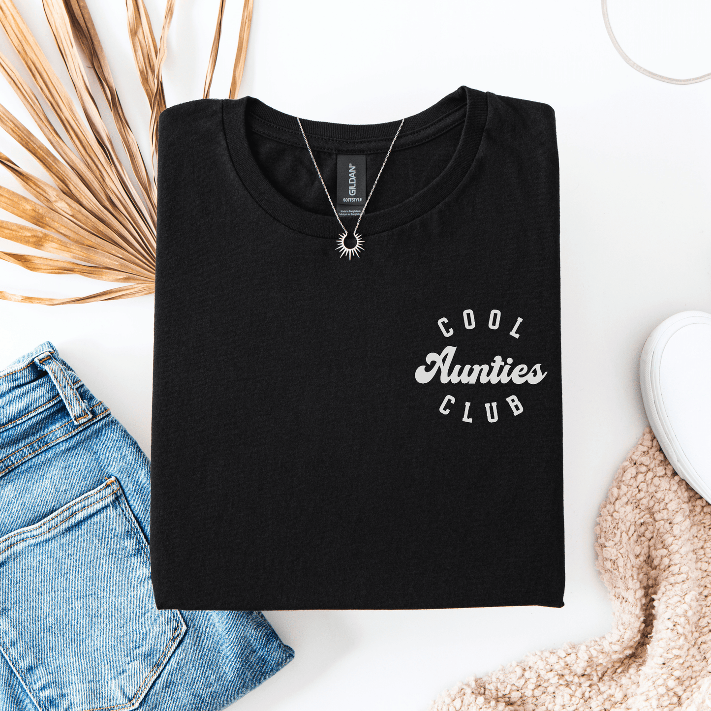 Black folded tee with white Cool Aunties Club Shirt . design by Maddy and George Designs styled with jeans and necklace