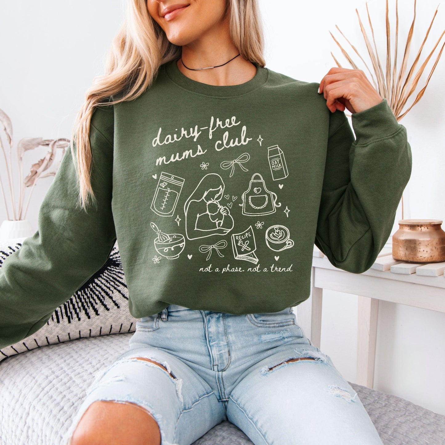 Maddy and George Designs green cropped Dairy Free Mums Club Sweatshirt . white line art of mum with baby and dairy free icons