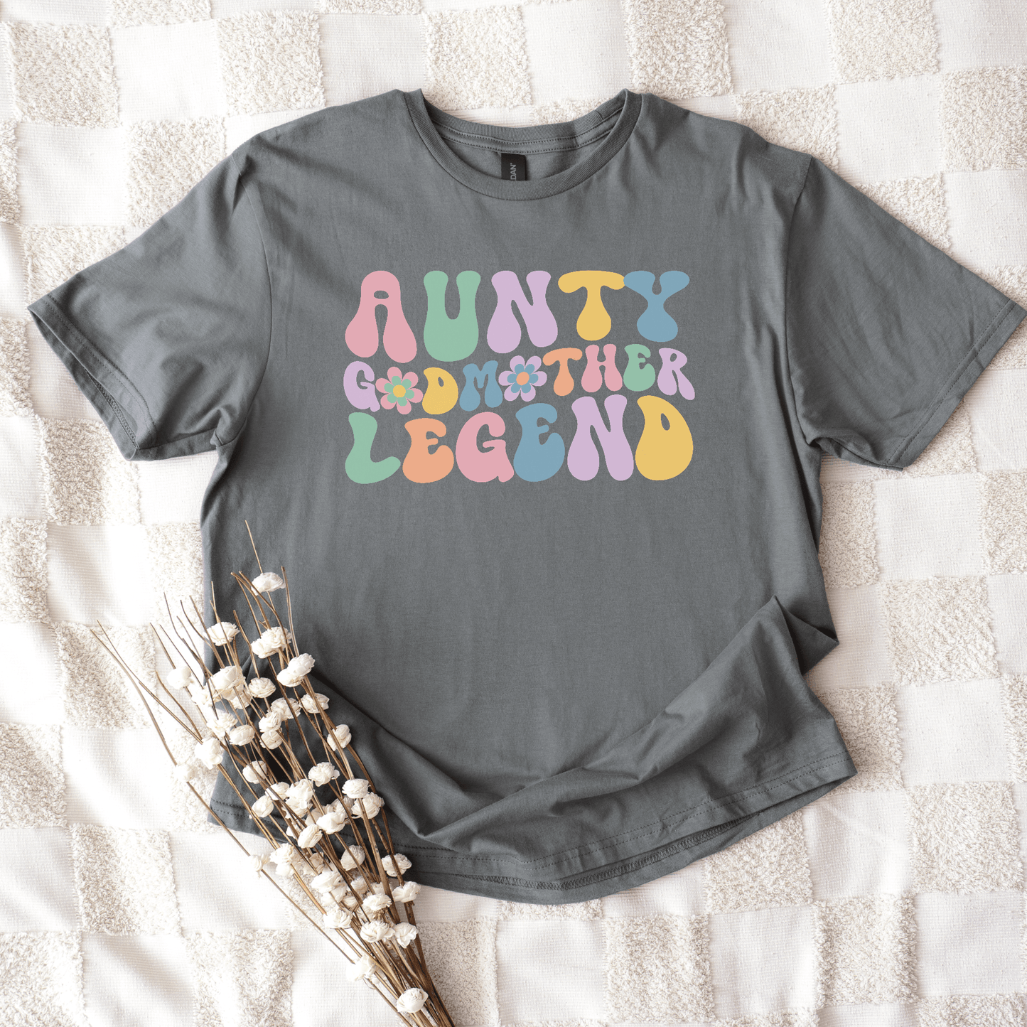 Gray cotton tee with retro pastel flower letters reading aunty godmother legend shirt from Maddy and George Designs