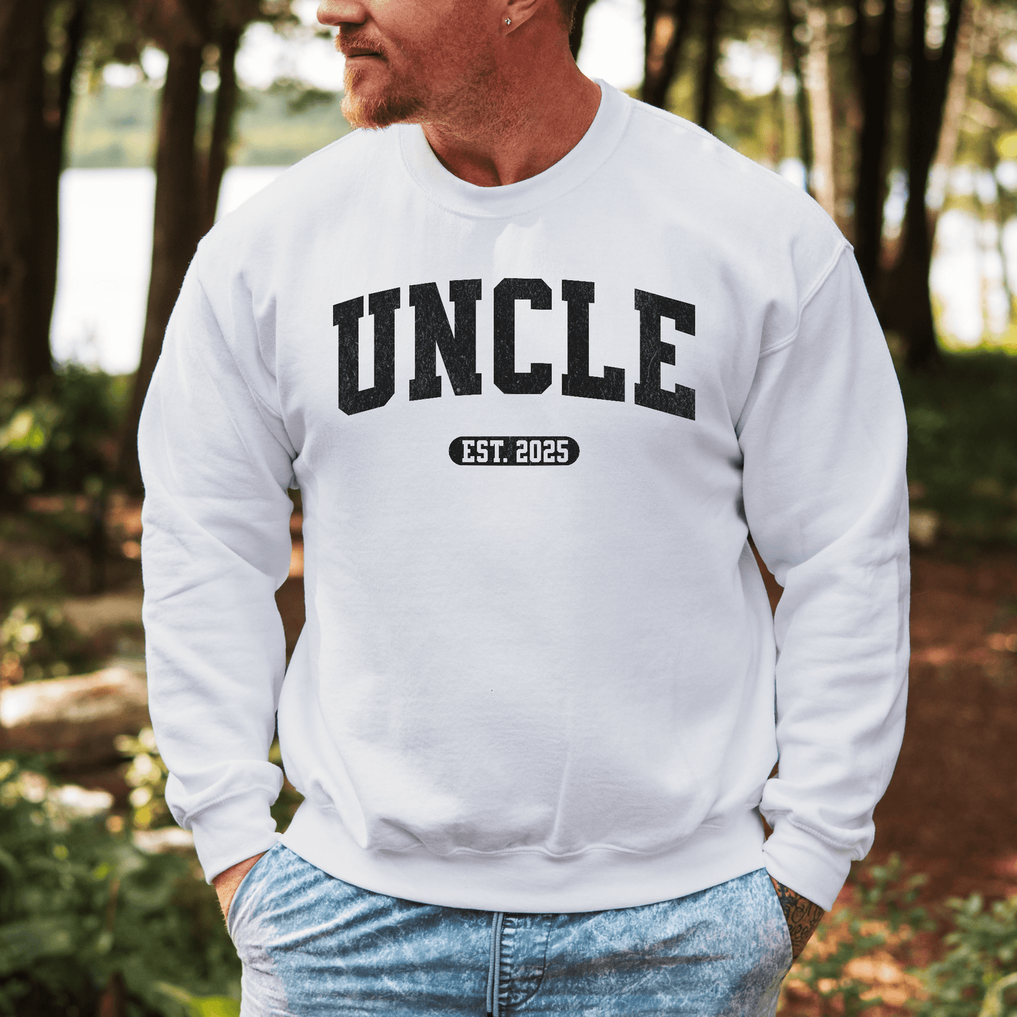 Maddy and George Designs Custom Uncle EST. Year Sweatshirt worn by man outdoors white crewneck with EST 2025 print