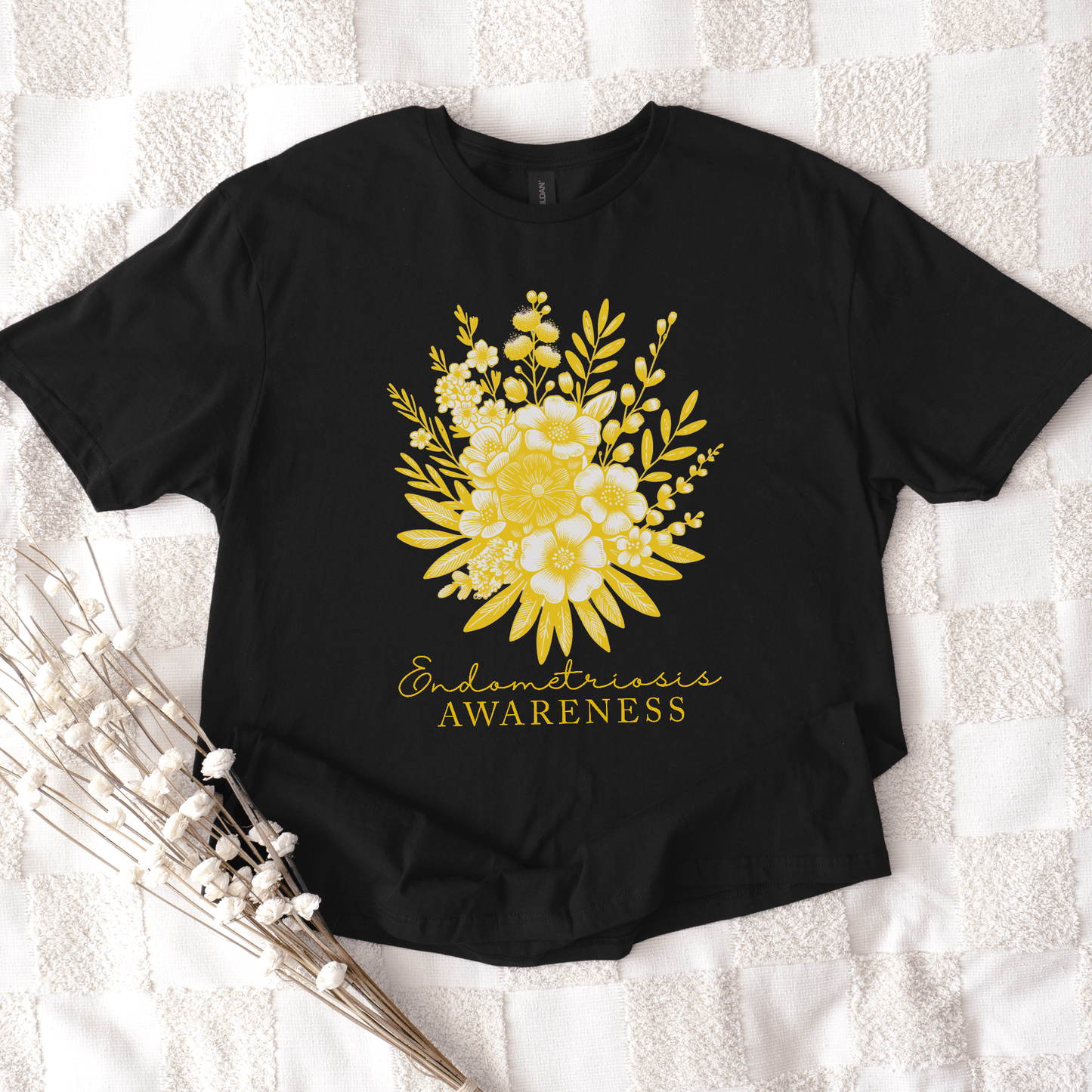 Floral Endometriosis Awareness Shirt | Gift For Endo Warrior. Black tee with yellow floral bouquet by Maddy and George