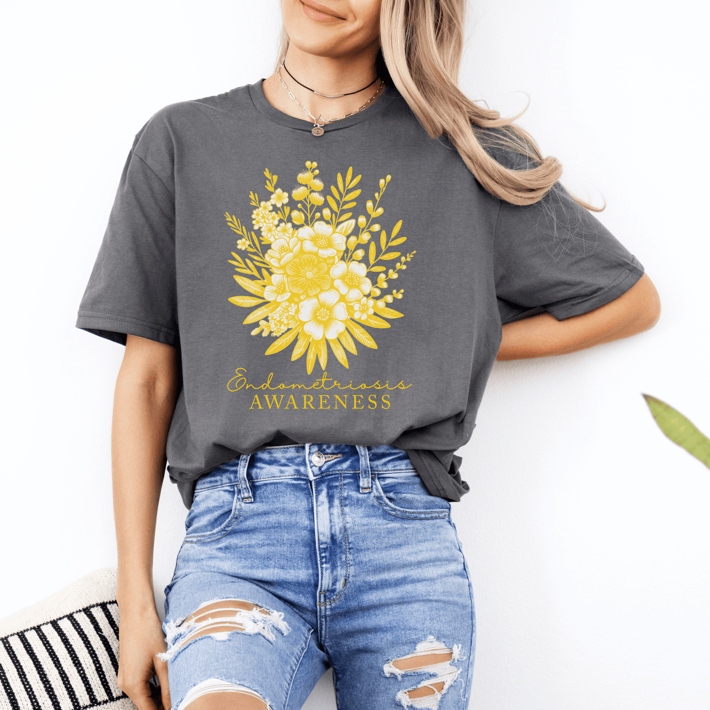Model wearing gray floral tee with yellow bouquet and text, Floral Endometriosis Awareness Shirt | Gift For Endo Warrior