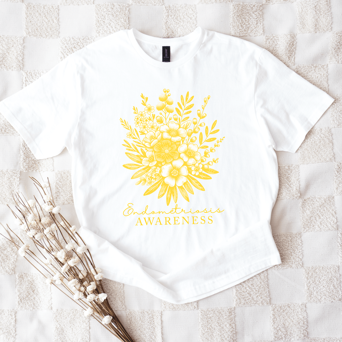White shirt with yellow floral print and Endometriosis Awareness text Floral Endometriosis Awareness Shirt | Gift For Endo Warrior.