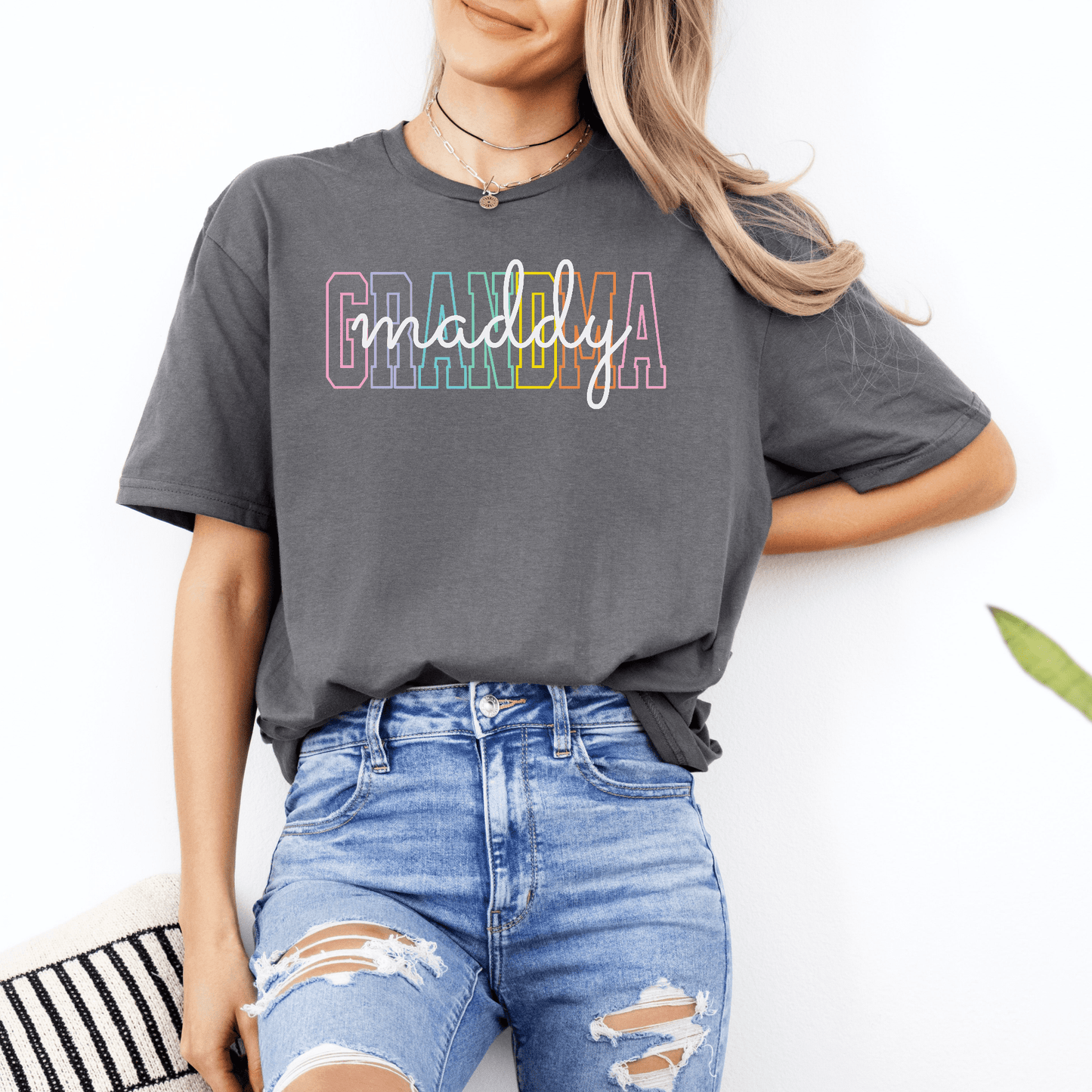 Custom Nannie Shirt charcoal oversized tee with colorful GRANDMA graphic and maddy script worn with ripped jeans