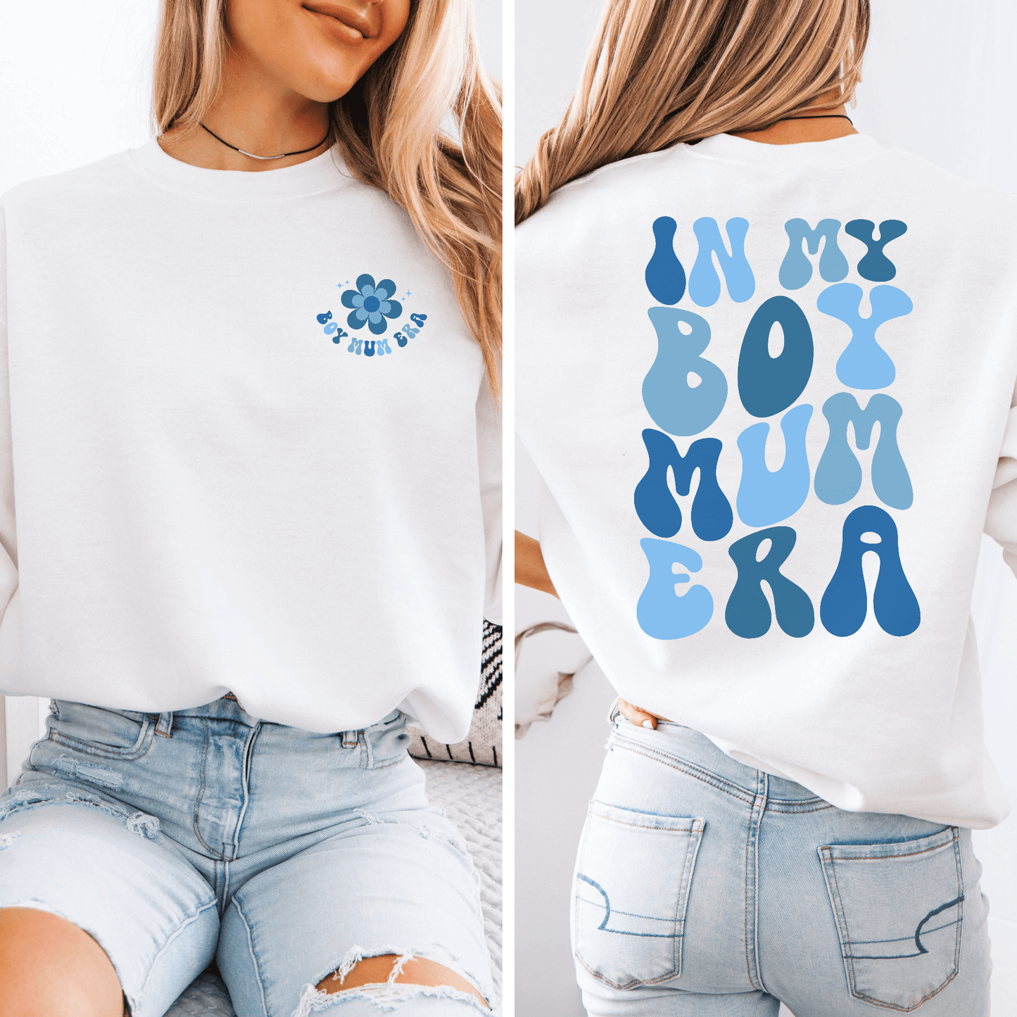 White sweatshirt with blue retro flower logo front and large blue bubble text back worn by model In My Boy Mum Era Sweatshirt