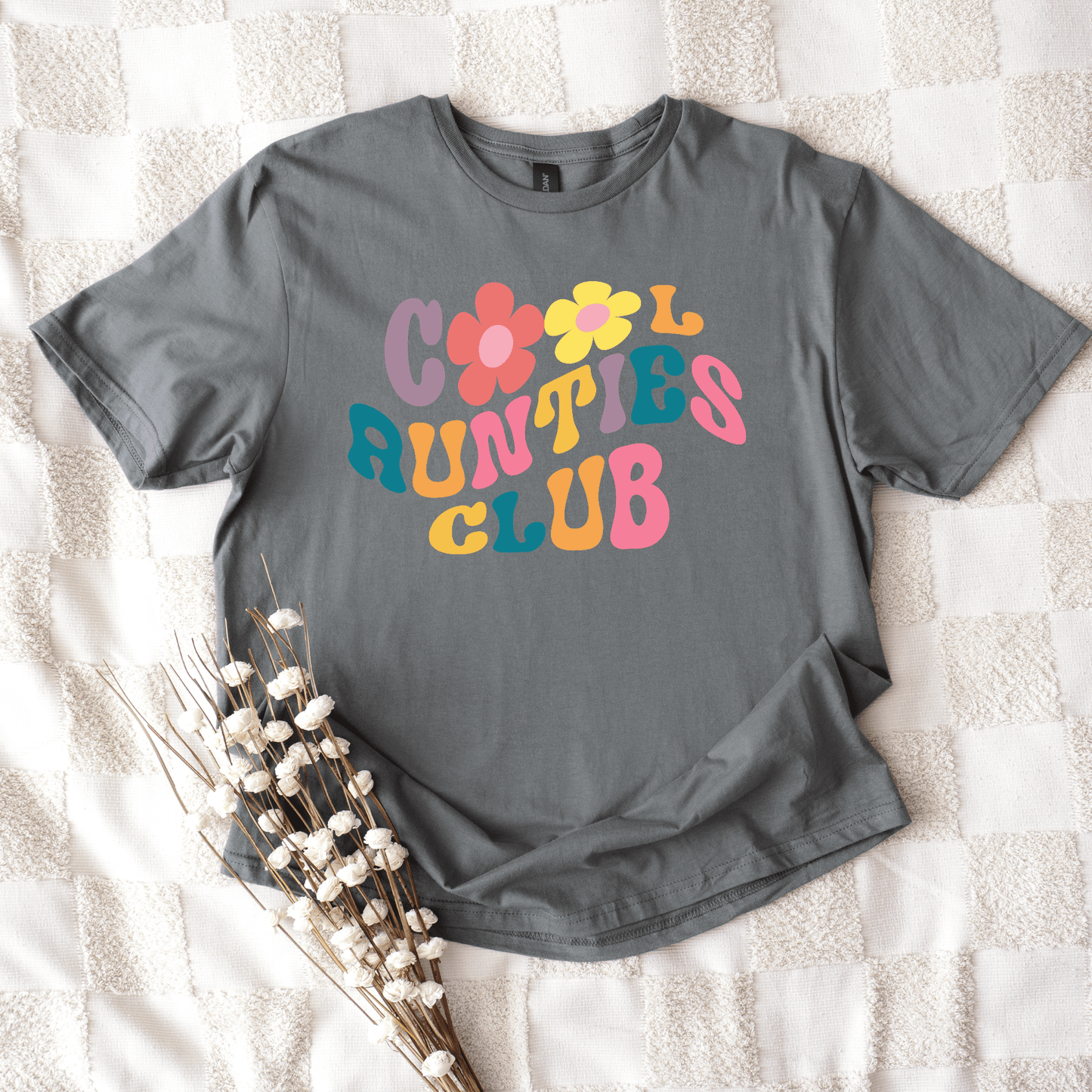 Retro Cool Aunties Club Shirt gray tee with colorful 70s style lettering and flower graphics by Maddy and George Designs