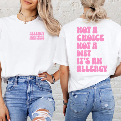 Allergy Awareness Shirt white tee with small pink chest logo and bold pink back text saying not a choice not a diet