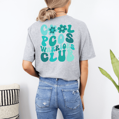 Back view of woman wearing gray PCOS Awareness Shirt with teal Cool PCOS Warriors Club design by Maddy and George Designs
