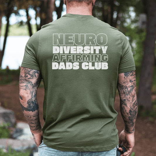 Neurodiversity Affirming Dads Club Shirt . Olive green tee on tattooed dad showing bold white typographic back print