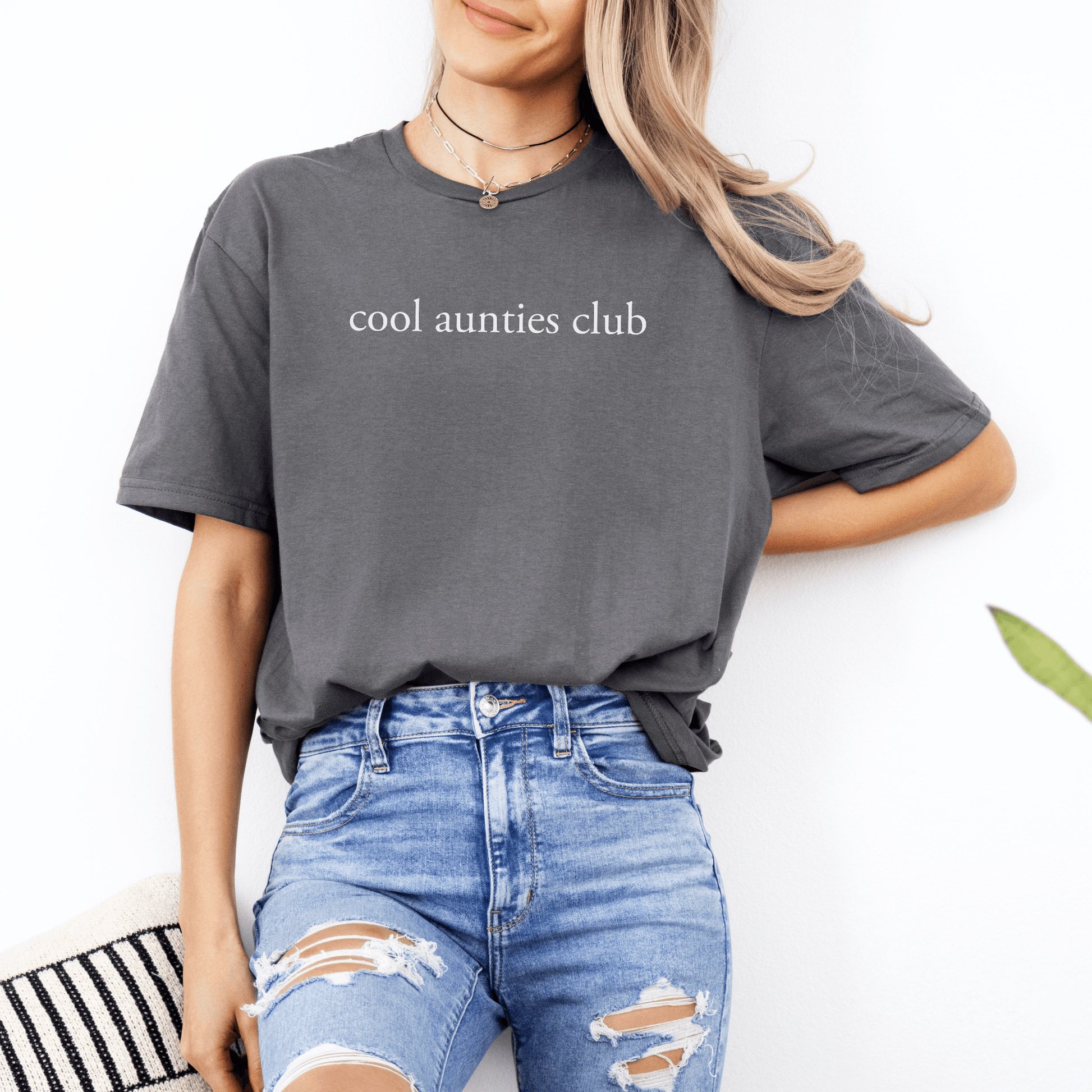 Maddy and George Designs print showing charcoal t shirt reading cool aunties club on model New Auntie Pregnancy Announcement Gift