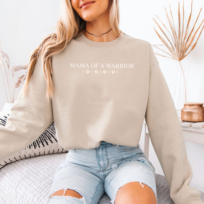 Model wearing beige Mama of a Warrior Sweatshirt with star design casual loungewear look with ripped jeans