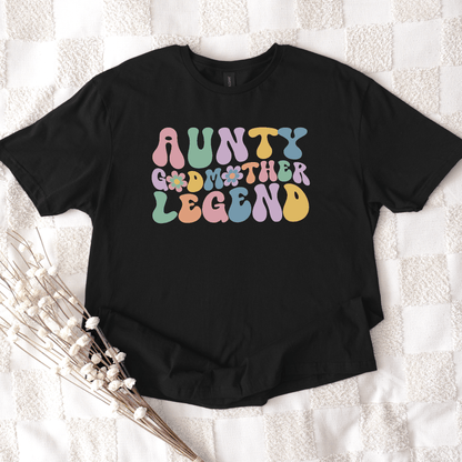 Black cotton t shirt by Maddy and George Designs with retro pastel print reading aunty godmother legend shirt ideal gift