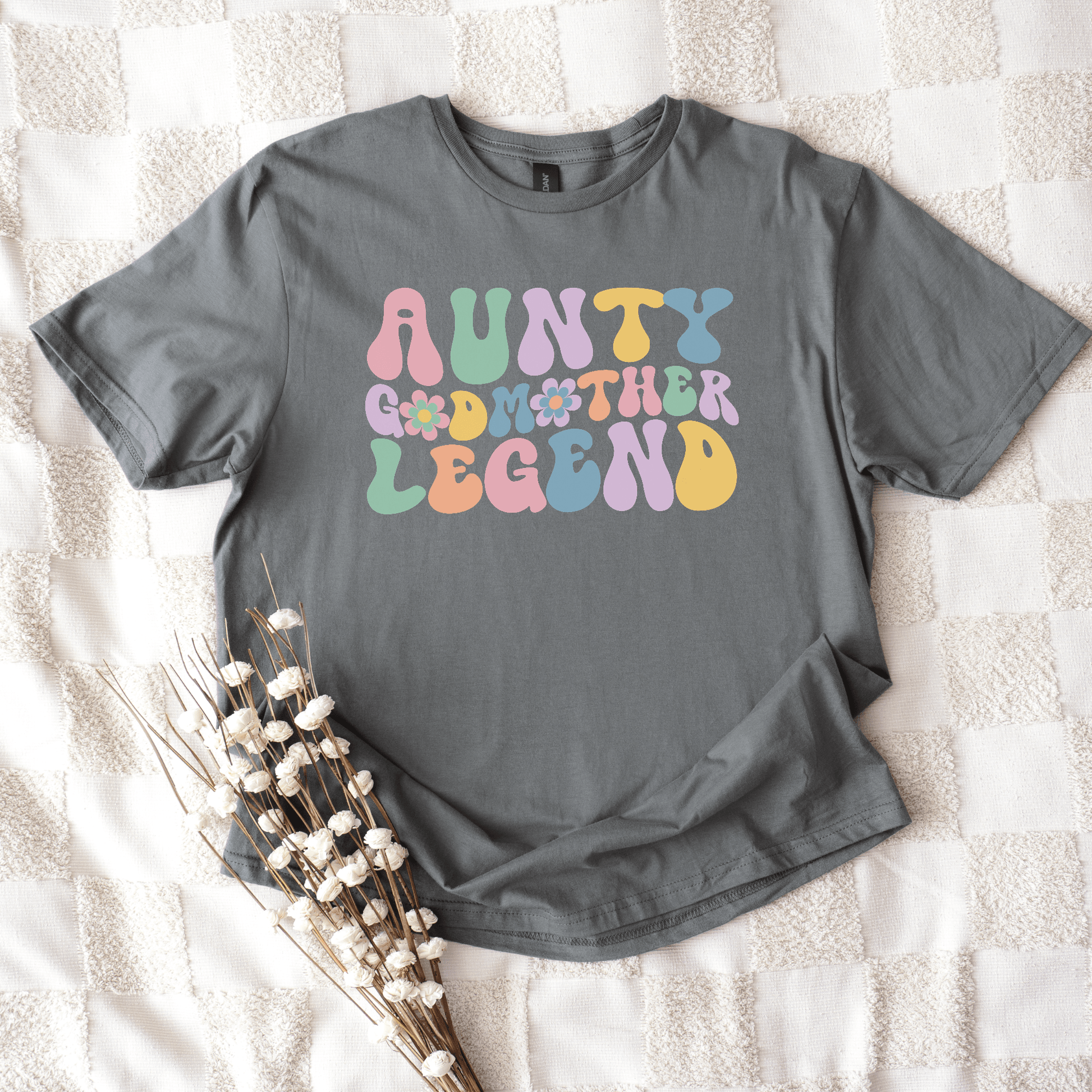 Gray cotton tee with retro pastel flower letters reading aunty godmother legend shirt from Maddy and George Designs