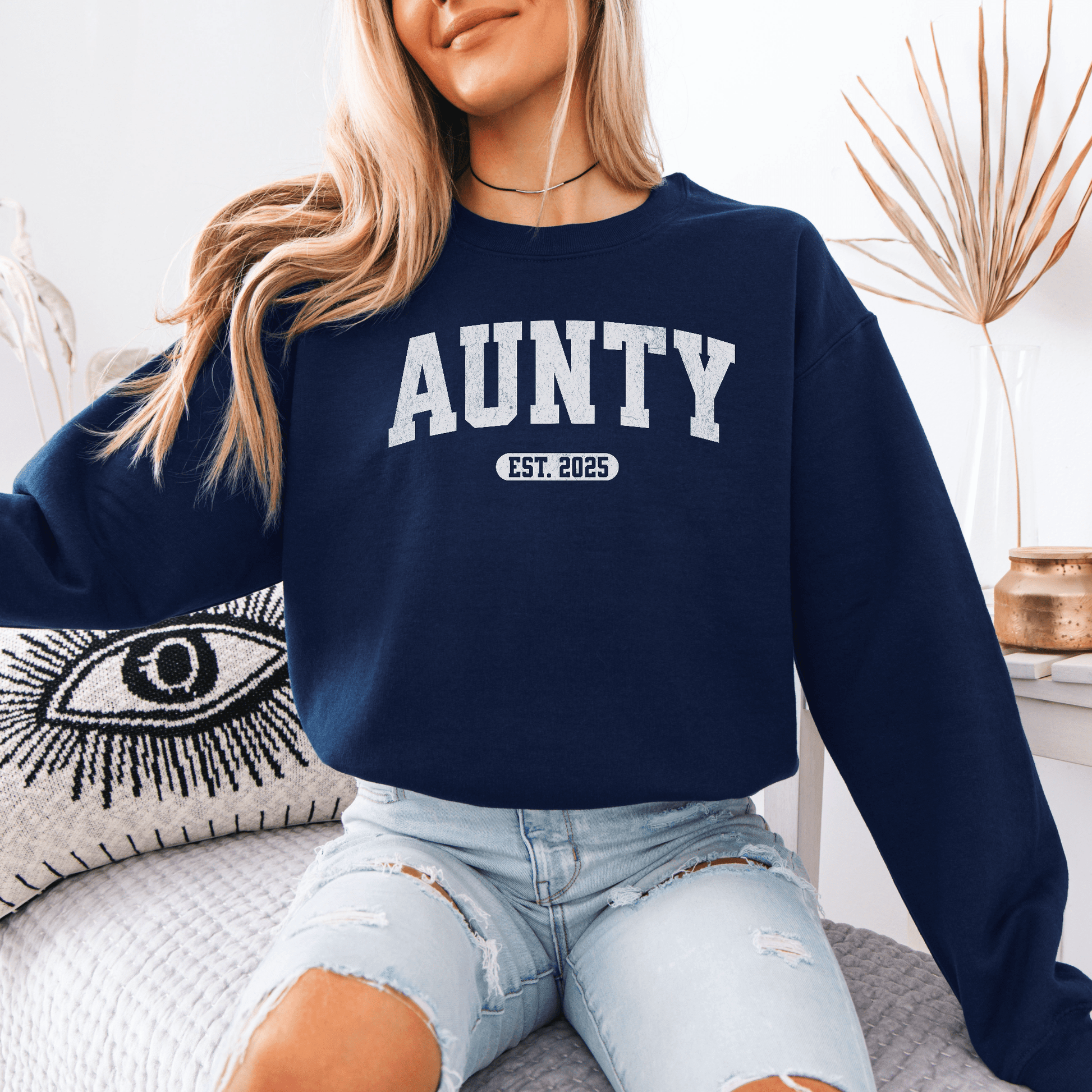 Maddy and George Designs custom aunty sweatshirt navy crewneck with AUNTY Est 2025 print worn by woman