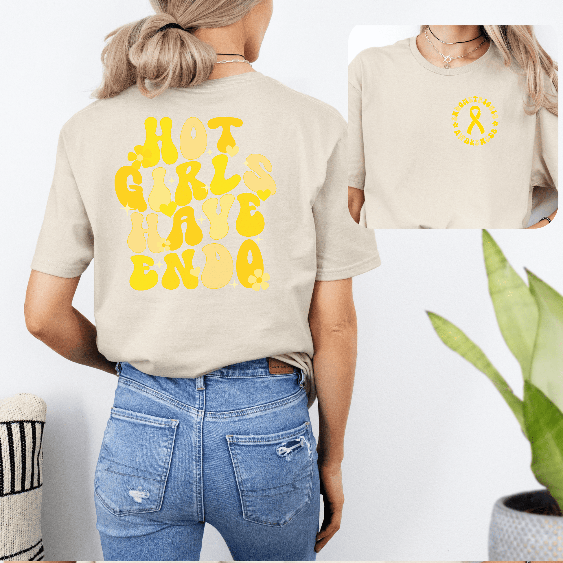 Endometriosis Awareness Shirt beige tee with yellow ribbon chest emblem and bold back text Hot Girls Have Endo