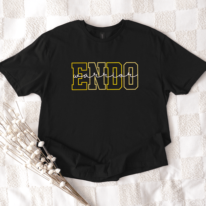 Endometriosis Awareness Shirt | Gift For Endo Warrior black tee with bold yellow outlined ENDO letters laid flat