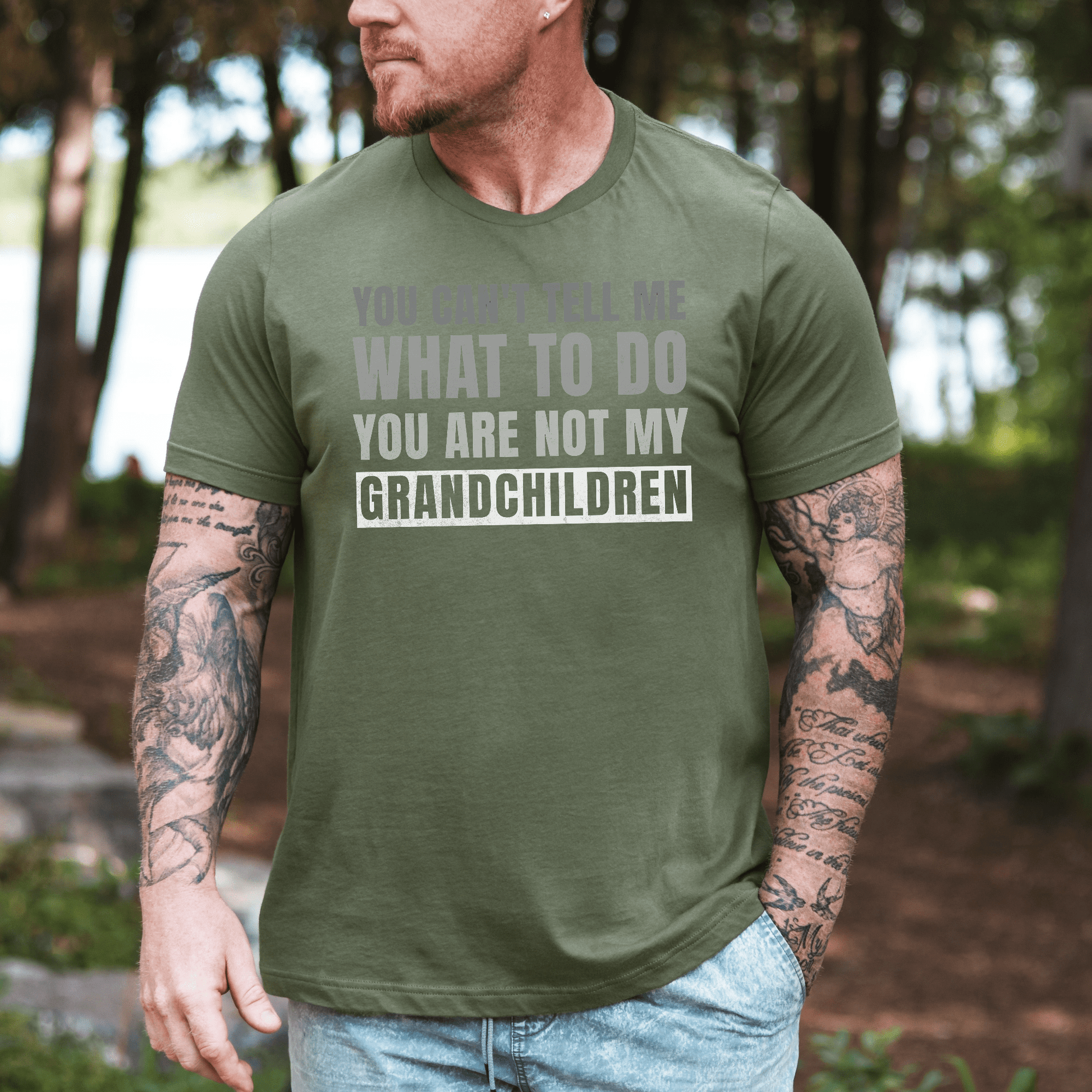Maddy and George Designs Funny Grandpa T-Shirt olive green with bold grandchildren slogan on chest outdoors