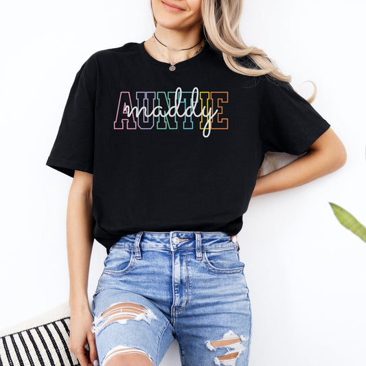 Custom Auntie Shirt black tee with multicolor outlined AUNTIE graphic and handwritten maddy name by Maddy and George Designs