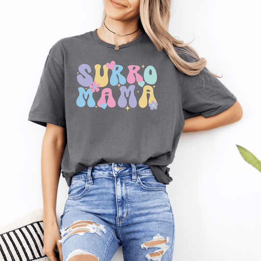 Cute Surrogate Mama Shirt by Maddy and George Designs gray tee with pastel retro flower lettering on model