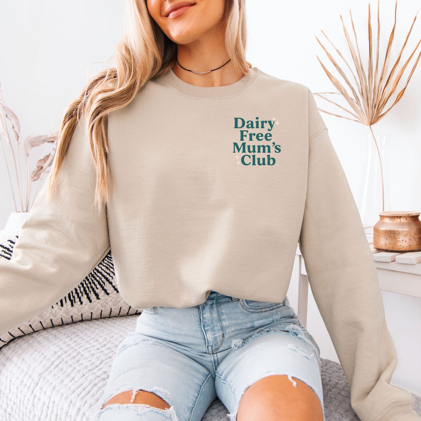 Maddy and George Designs model wearing beige Dairy Free Mum’s Club Sweatshirt with cozy fit