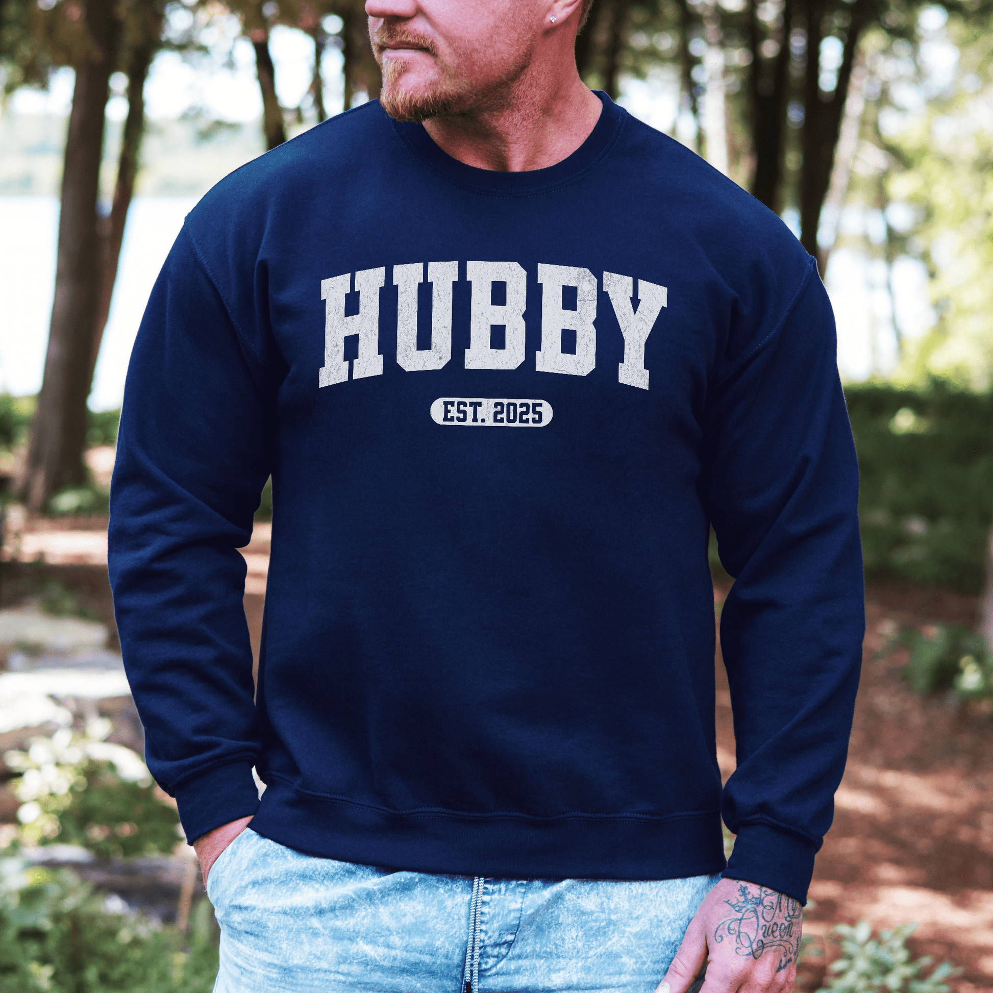 Maddy and George Designs navy crewneck sweatshirt on a man Custom Hubby EST Year Sweatshirt with HUBBY print