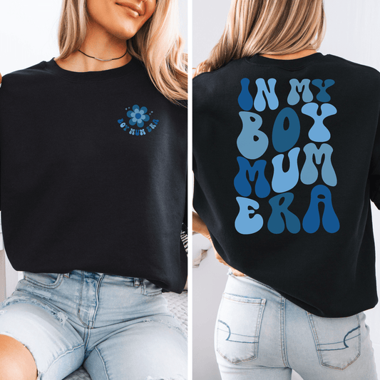 Black sweatshirt from Maddy and George Designs with small chest flower and large blue back print In My Boy Mum Era Sweatshirt