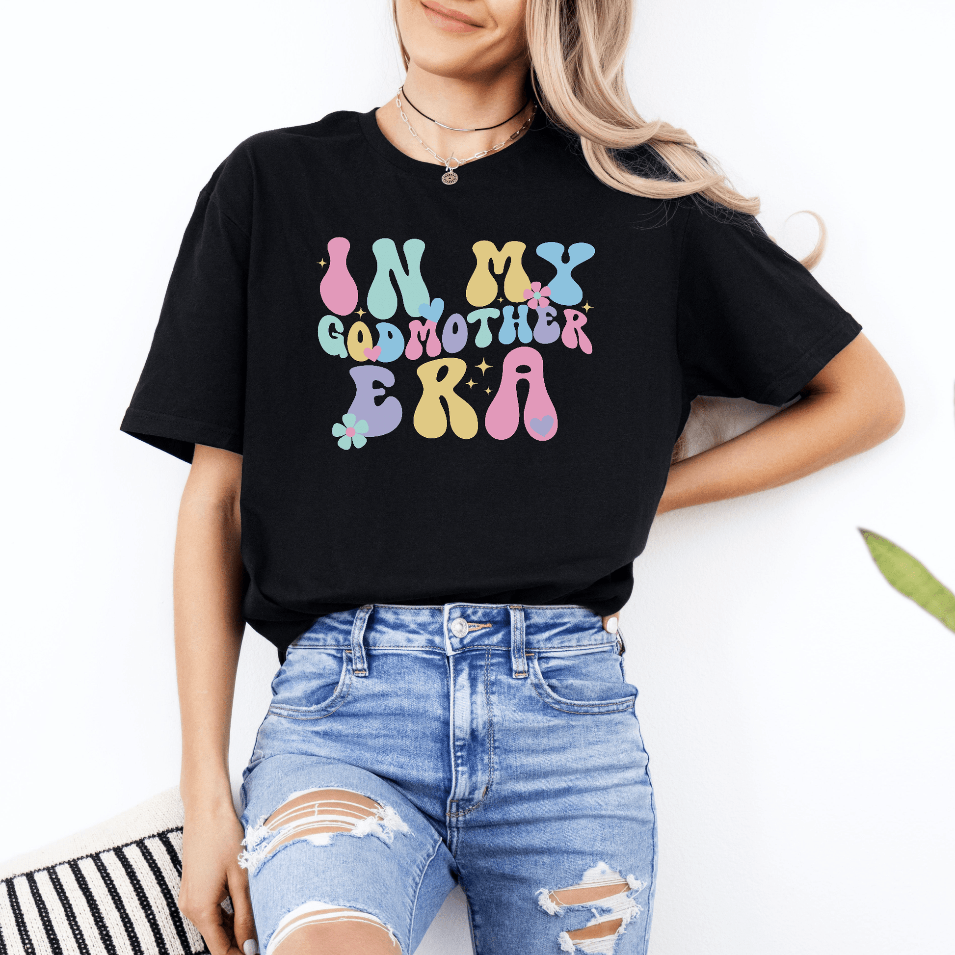Black graphic tee with pastel retro bubble text In My Godmother Era print Godmother Announcement Shirt ideal for gifting