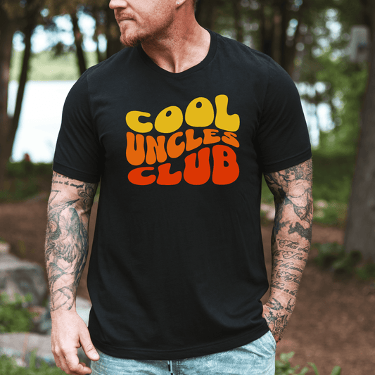 Maddy and George Designs Cool Uncles Club Shirt on black tee worn by tattooed man outdoors